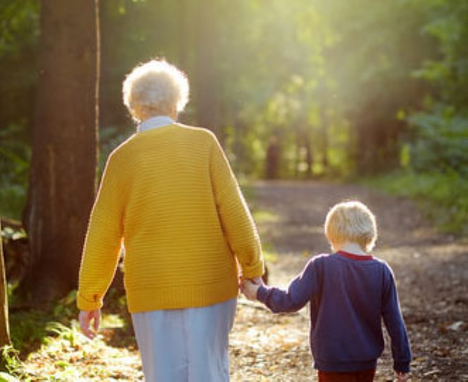 Child Walking with Grandparent